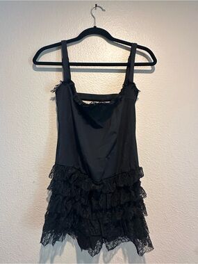 Edikted black ruffle romper with Pink Logo Tag